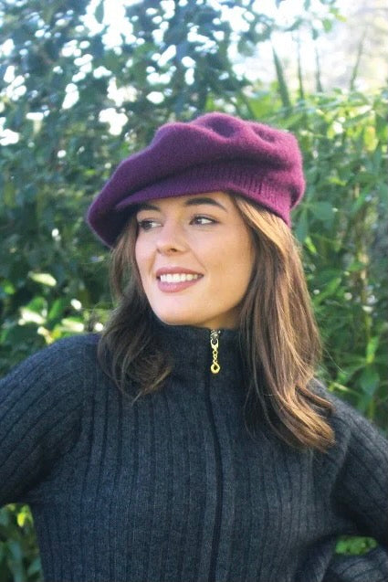 purple possum merino wool hat with brim on female model