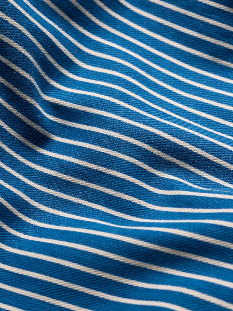 Close-up of blue fabric with white stripes