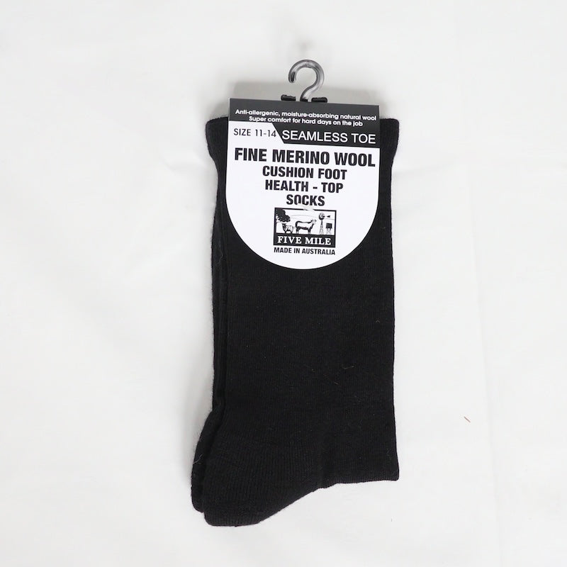 Australian made black merino wool cushioned sock on white background with seamless toe
