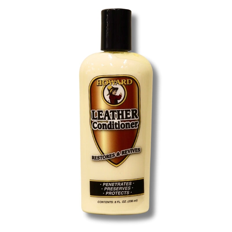 Howard's Leather Conditioner in plastic bottle with brown label on white background. Penetrates, preserves & protects smooth leather. Revives dried-out leather back to its soft, natural condition.