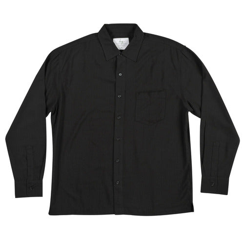 Men's long sleeve black bamboo shirt with chest pocket flat lay on white background