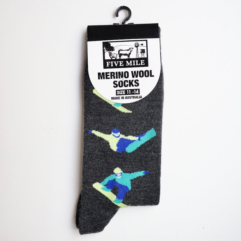 Australian made merino wool grey socks with snow boarder design, on a white background