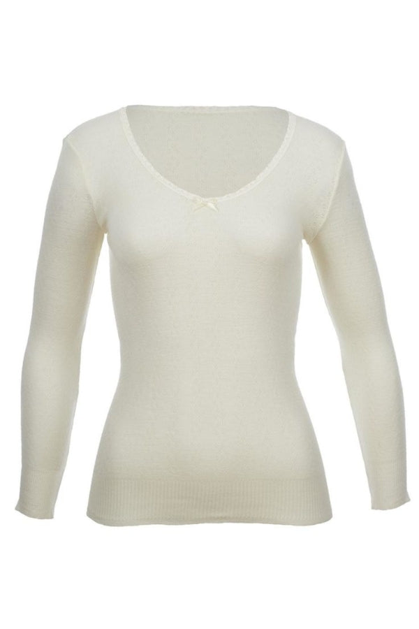 Women's white thermal long sleeve v-neck top on white background.
Made in Australia from 100% pure Merino Wool, offers superior warmth, comfort & breathability.