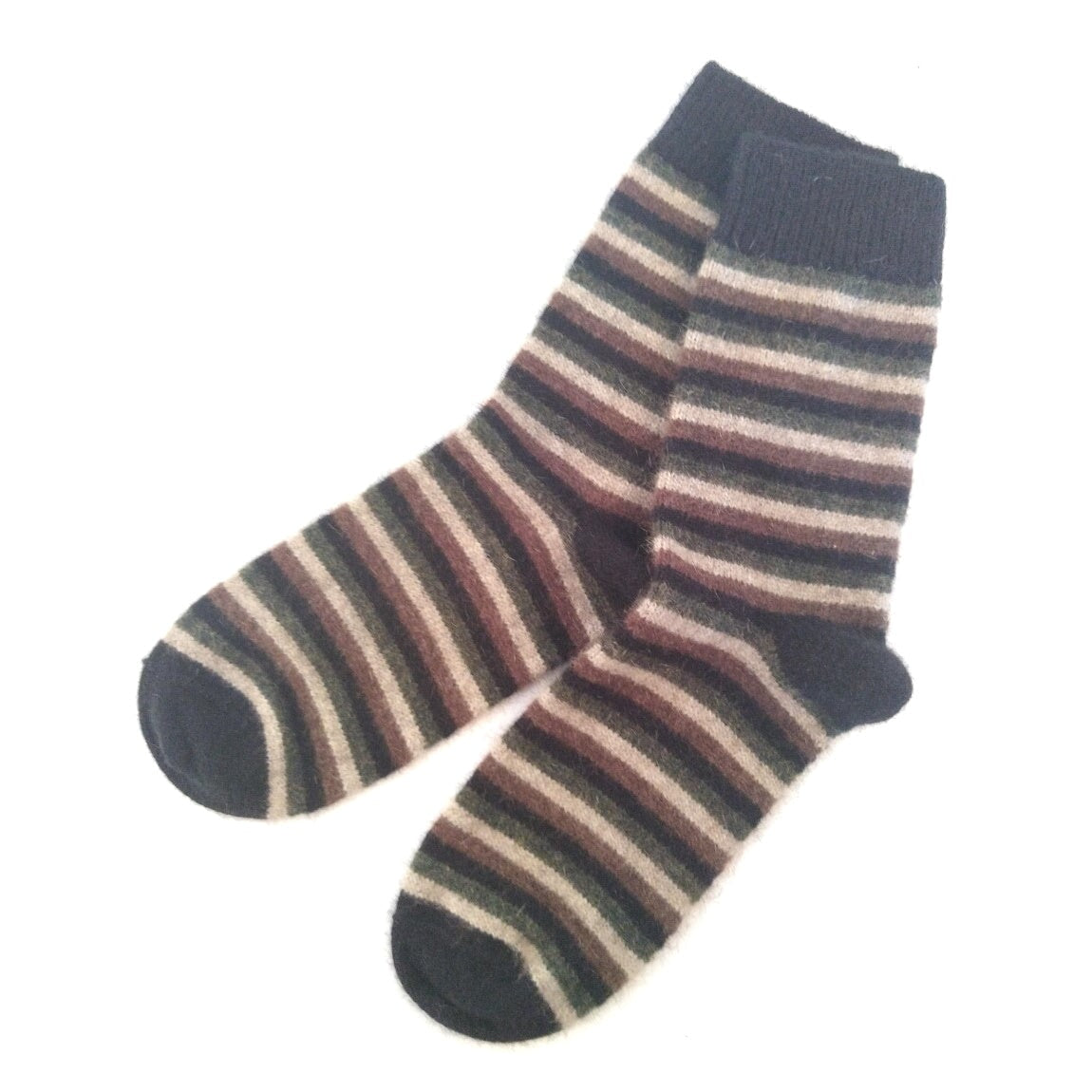 Possum and merino wool black striped socks flat lay on white background. Warm, soft and cosy warm winter wool socks