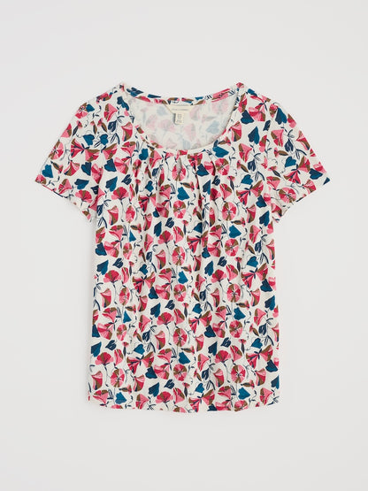 Floral patterned top on a white background