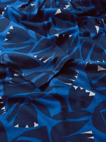 Blue fabric with abstract floral pattern