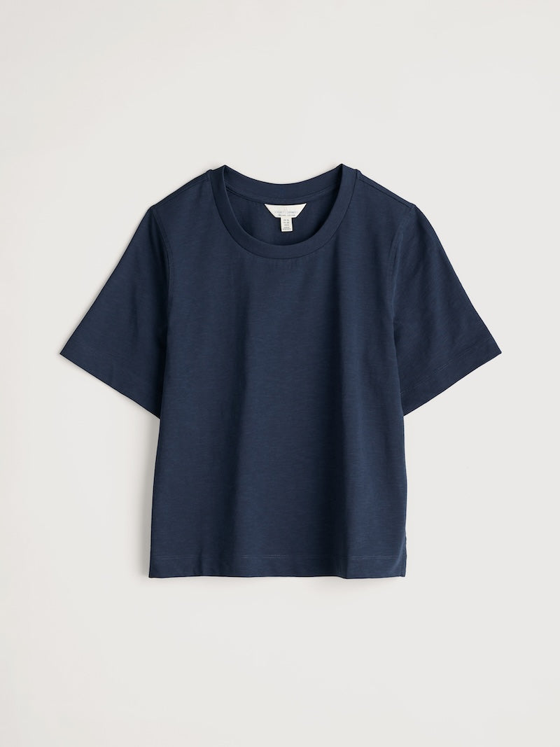Navy blue t-shirt on a light gray background