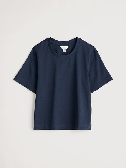 Navy blue t-shirt on a light gray background
