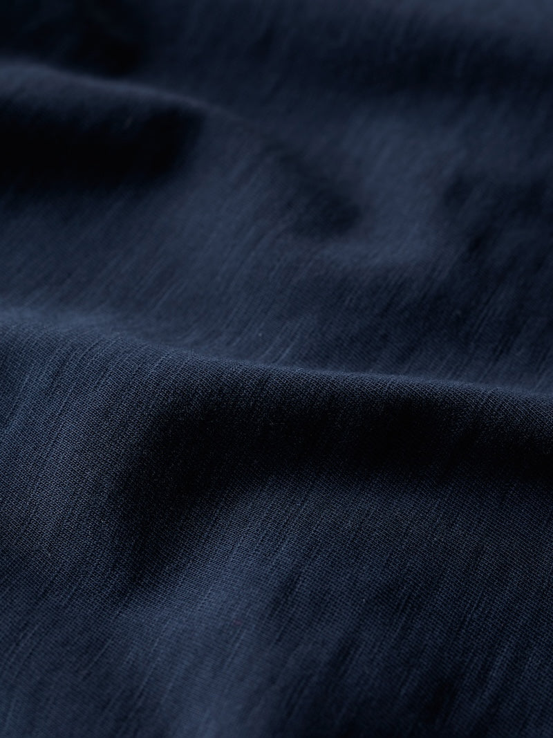 Close-up of dark blue fabric texture