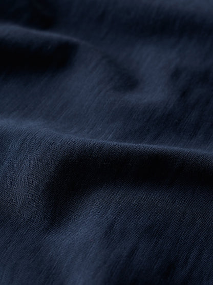 Close-up of dark blue fabric texture