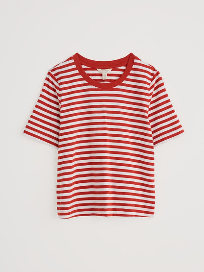 Red and white striped t-shirt on a light gray background