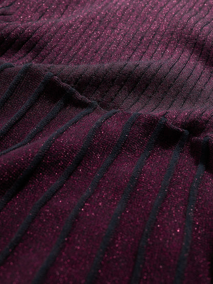 Close-up of a dark purple fabric with ribbed texture
