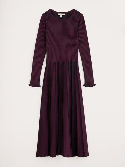 Purple ribbed dress with long sleeves on a white background