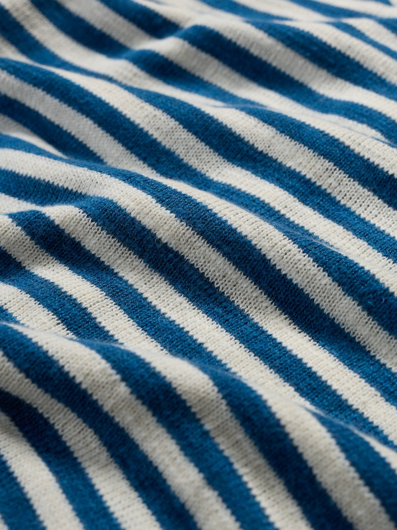 Close-up of blue and white striped fabric texture