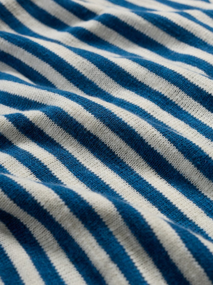 Close-up of blue and white striped fabric texture