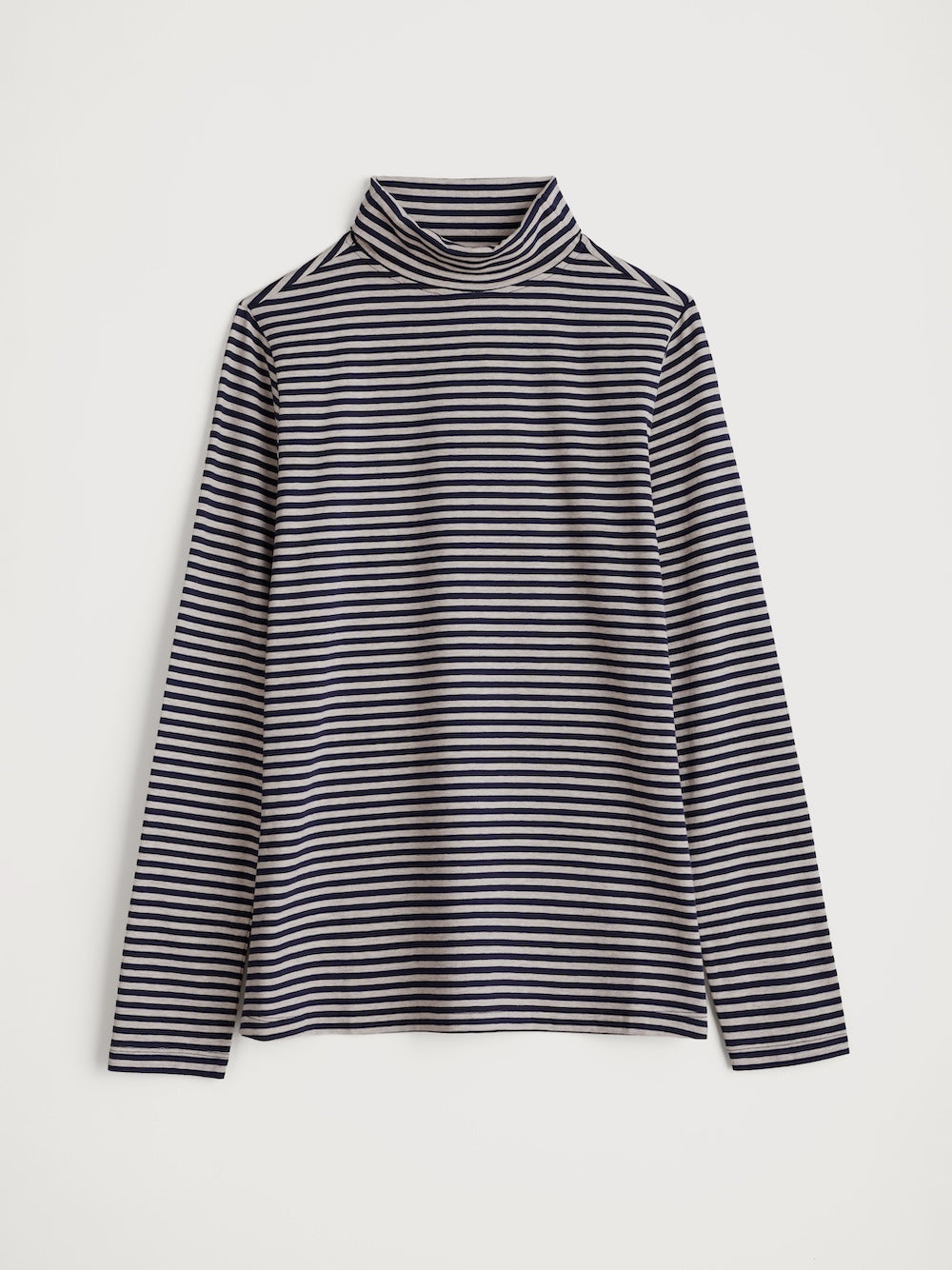 Black and white striped turtleneck sweater on a light gray background