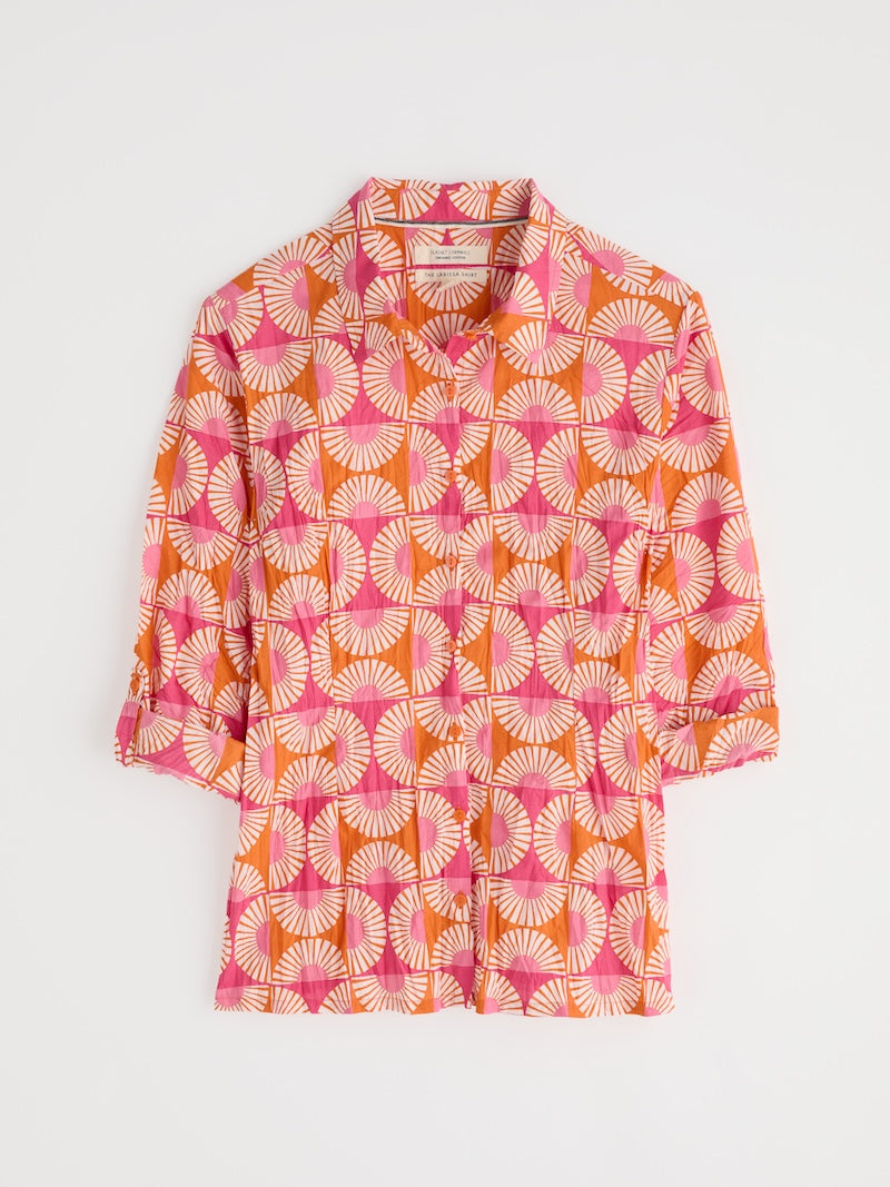 Patterned shirt with pink and orange design on a white background