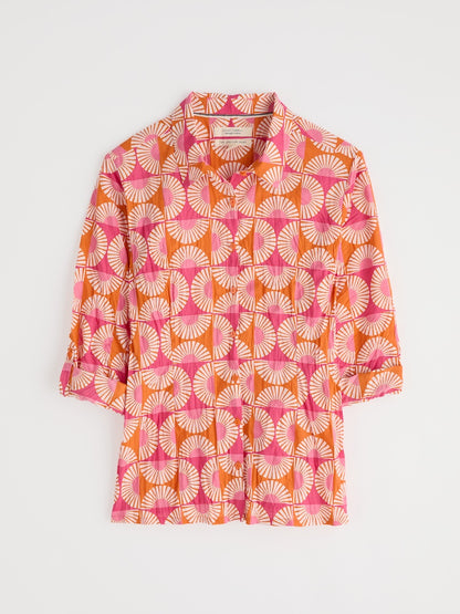 Patterned shirt with pink and orange design on a white background
