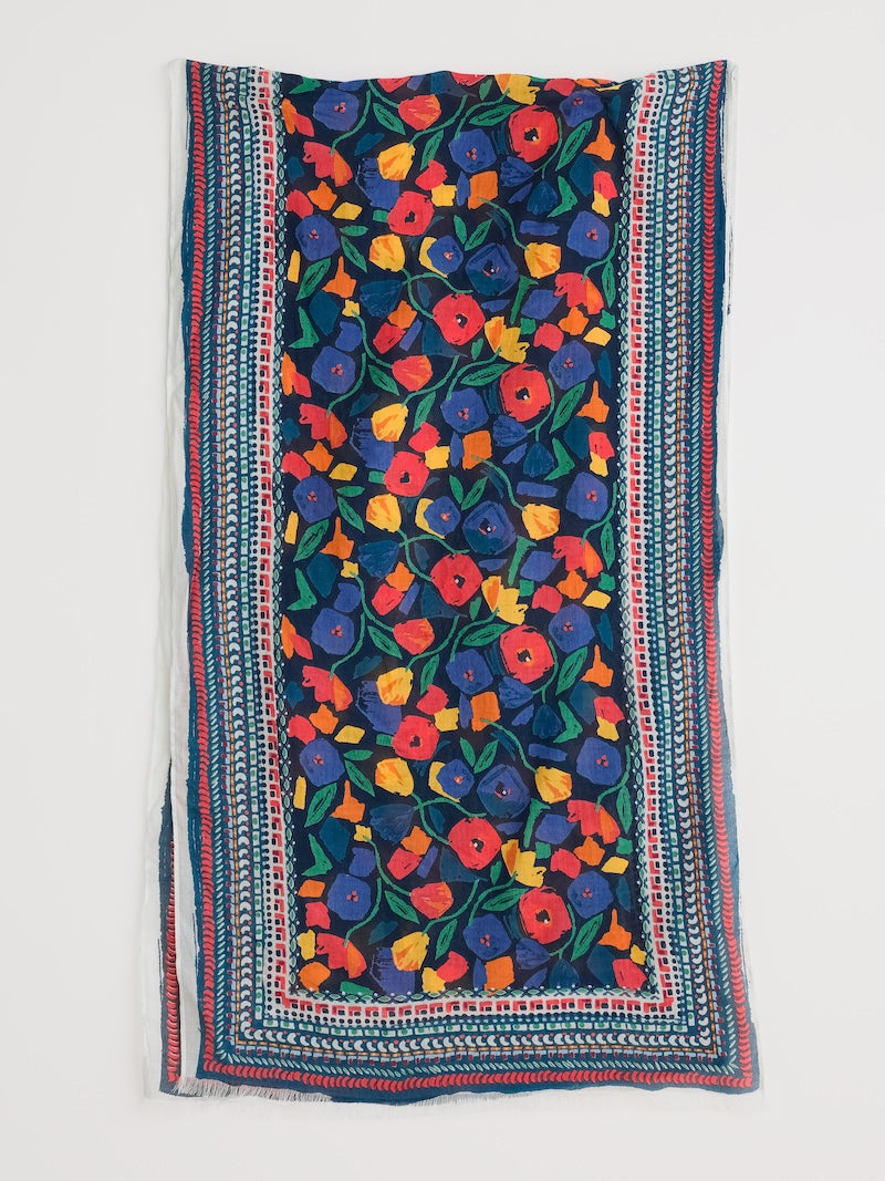 Colourful floral patterned scarf with a white background