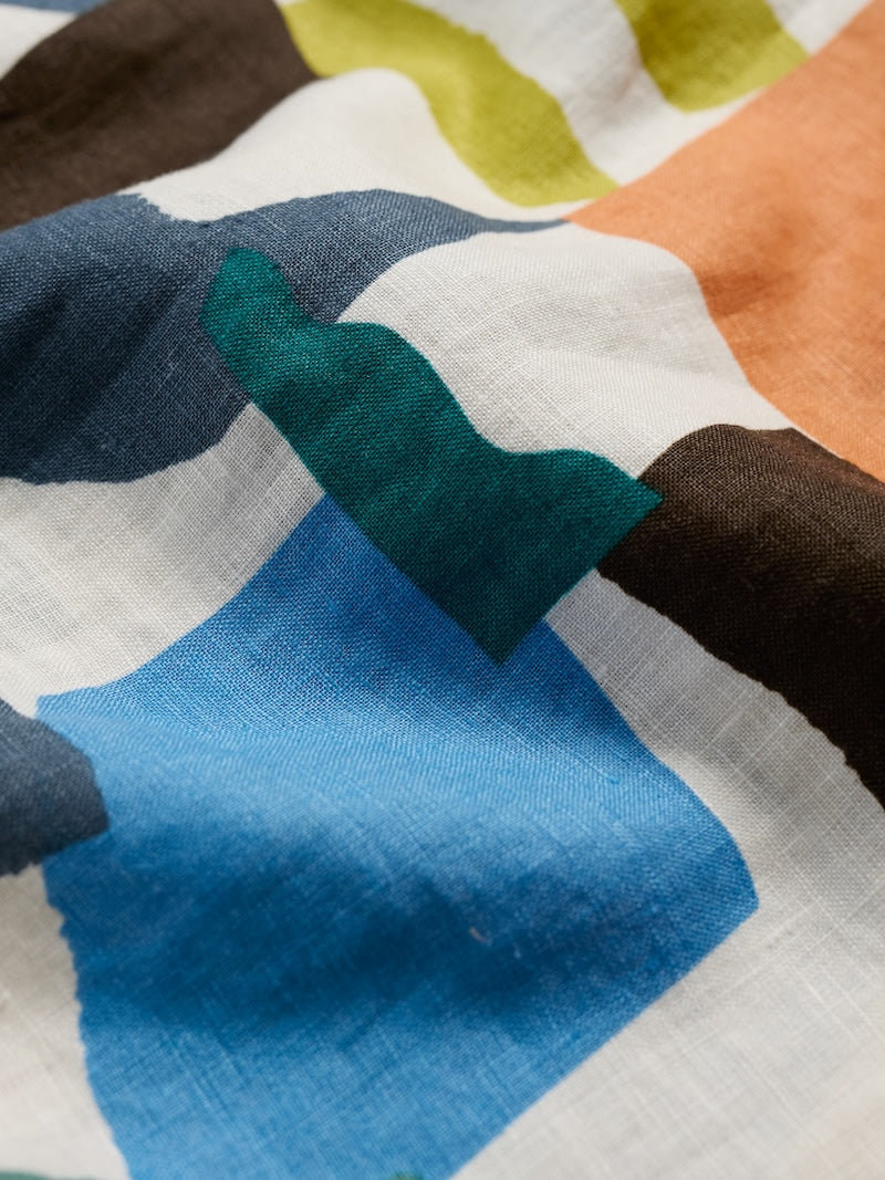 Close-up of fabric with colourful abstract pattern