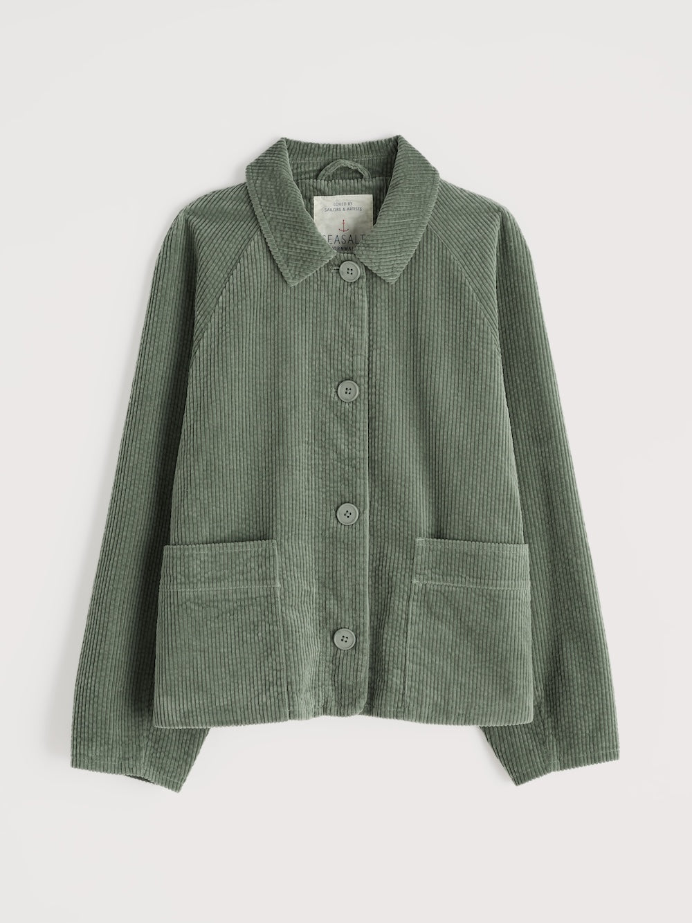 Green corduroy jacket on a light gray background