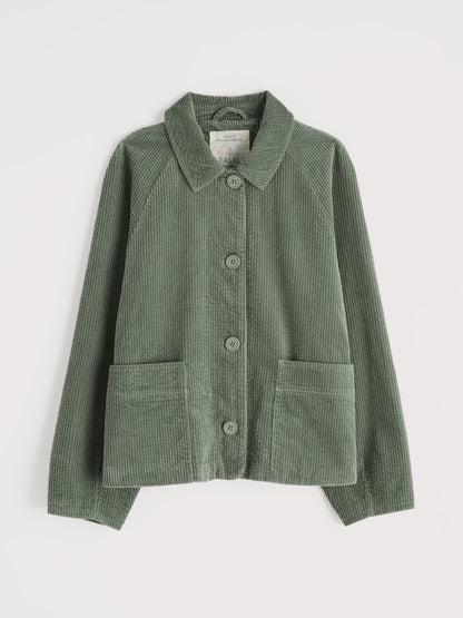 Green corduroy jacket on a light gray background