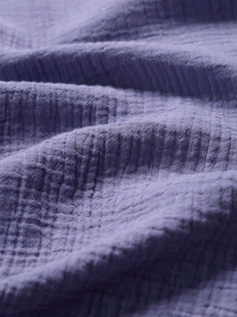 Close-up of textured purple fabric