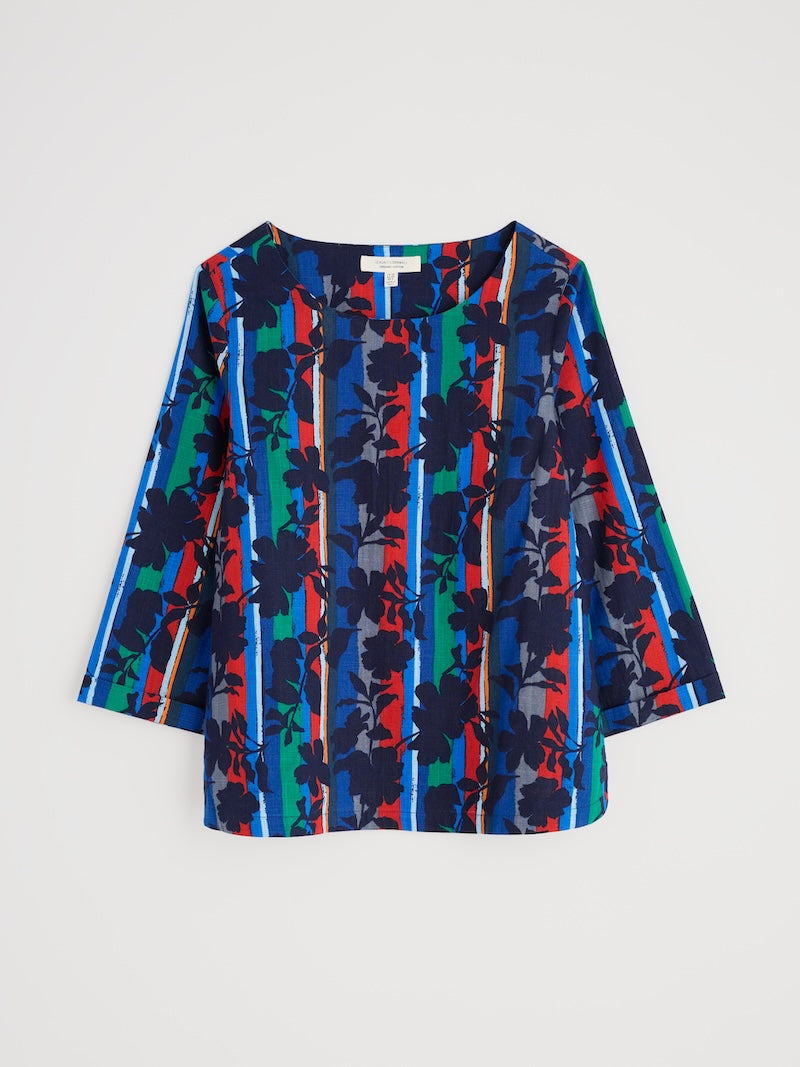 Colourful floral and striped top on a light grey background