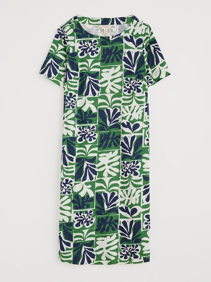 Green and blue patterned dress on a white background