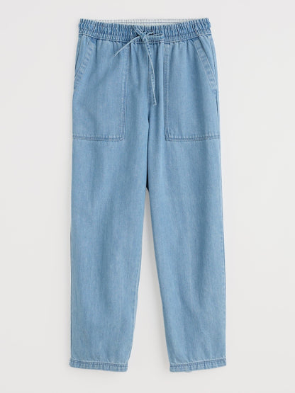 Light blue denim pants with drawstring on a white background