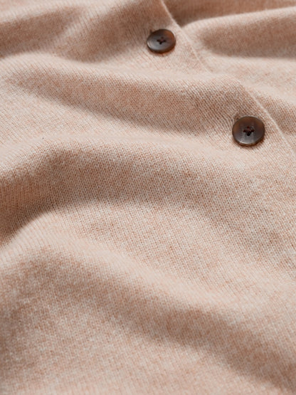 Close-up of a beige fabric with buttons