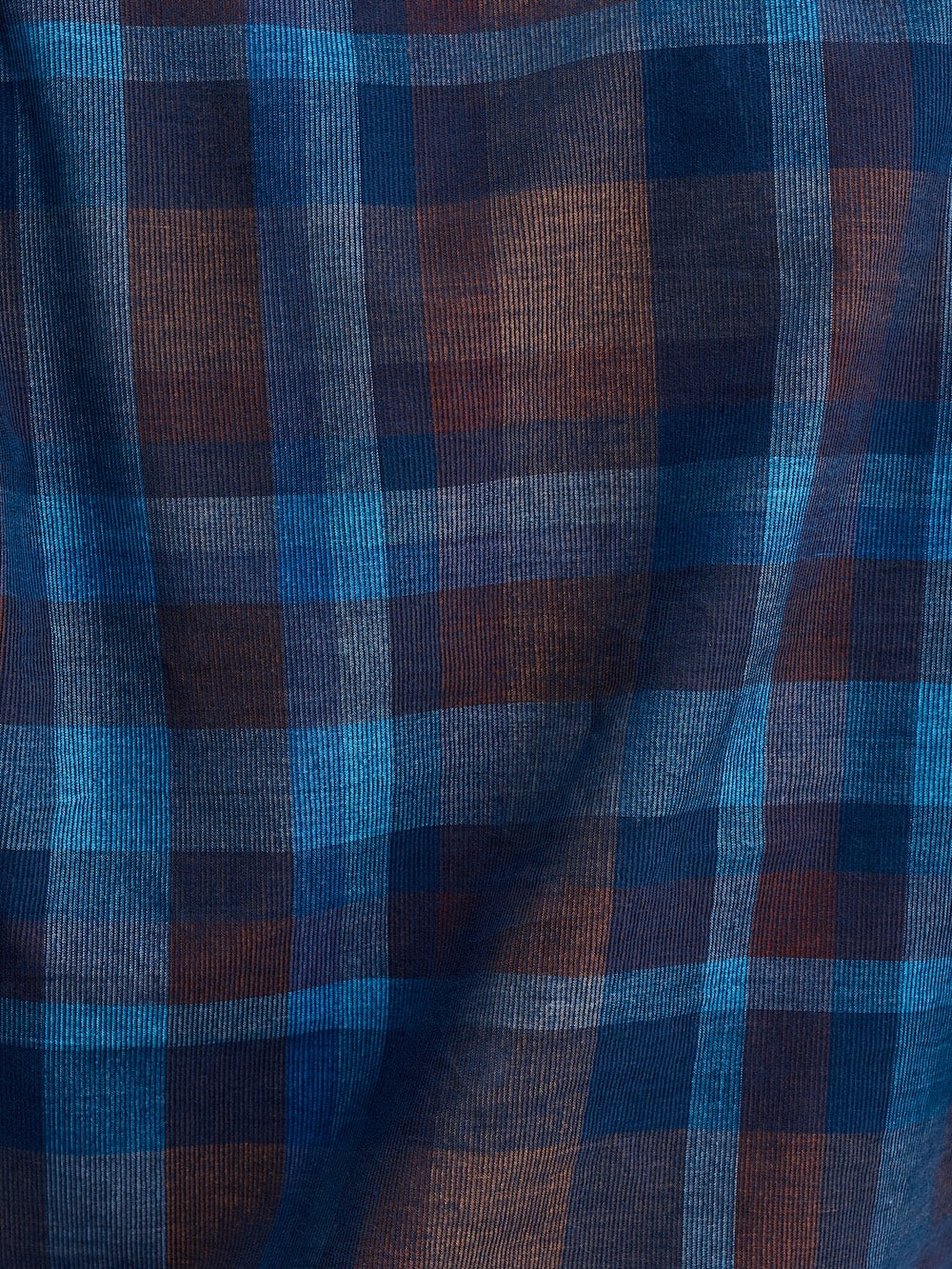 Close-up of blue and brown checkered fabric