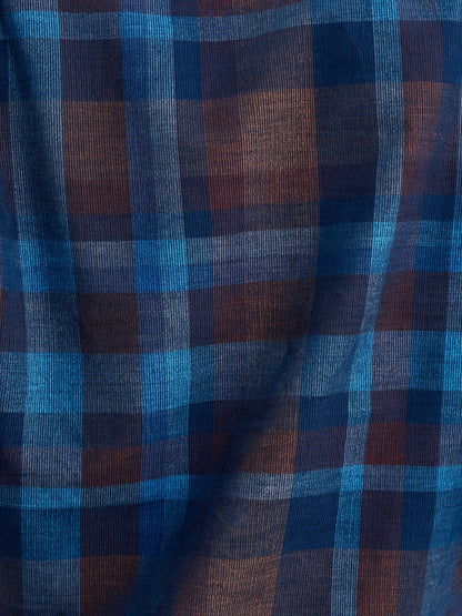 Close-up of blue and brown checkered fabric