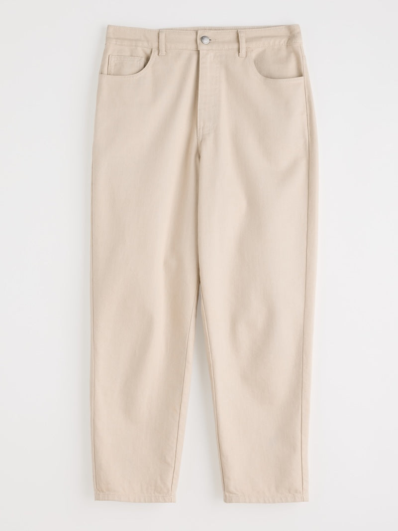 Beige jeans on a white background