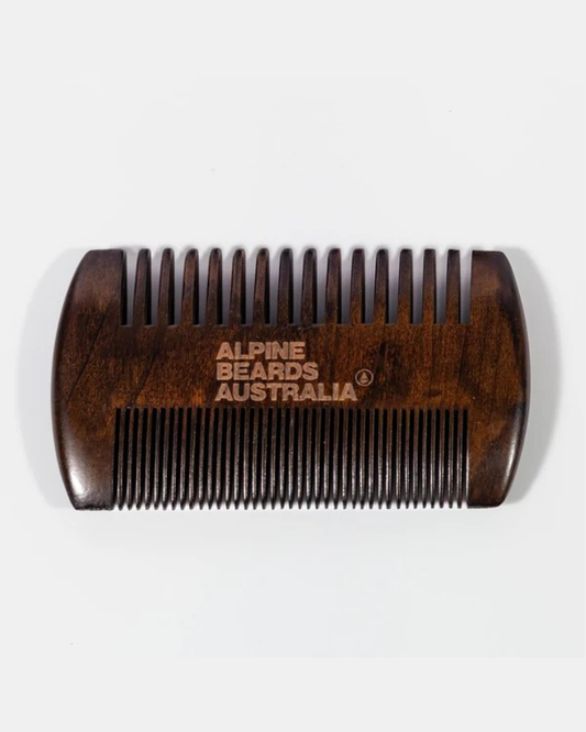 A dark brown wooden beard comb with 'ALPINE BEARDS AUSTRALIA' engraved on the handle, shown against a plain white background.