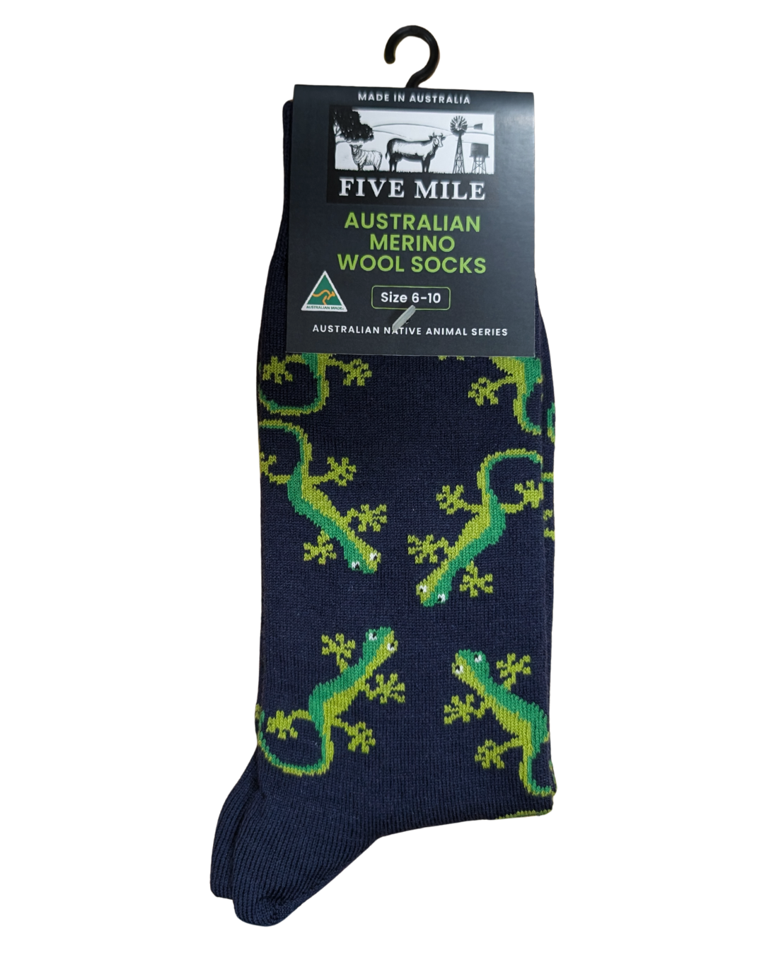 A single pair of Five Mile Australian Merino Wool Socks with a dark navy blue base and a green gecko pattern, attached to a black cardboard hanger packaging.