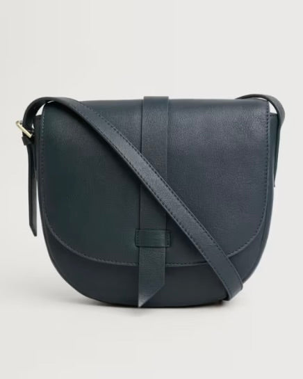 Navy leather crossbody bag on a light gray background