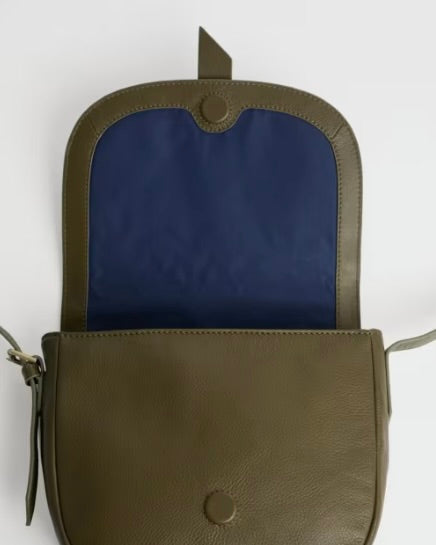 Green leather bag with blue interior on a white background