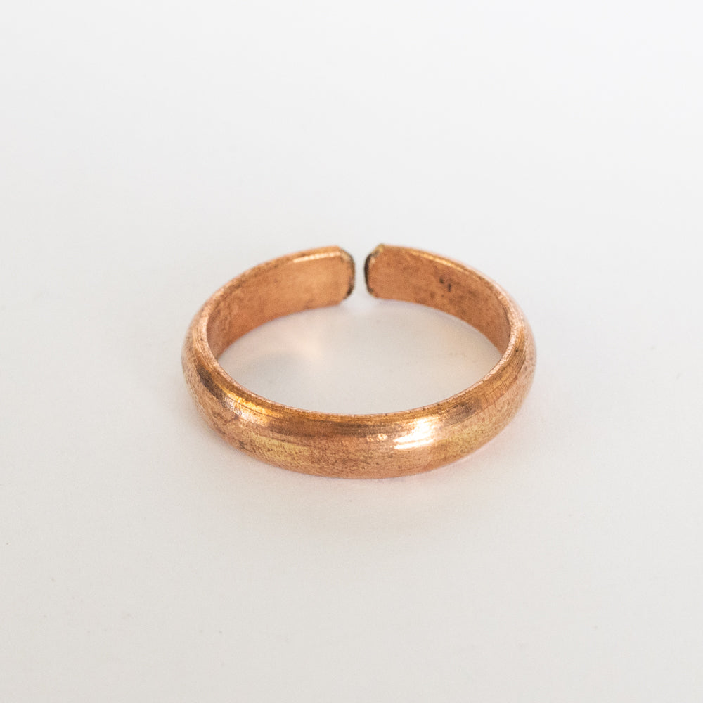 Copper ring on a white background