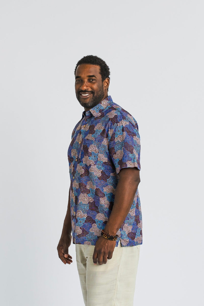 Blue and purple pattern mens bamboo button up shirt on male model on white background. Breathable, soft and comfy mens shirt