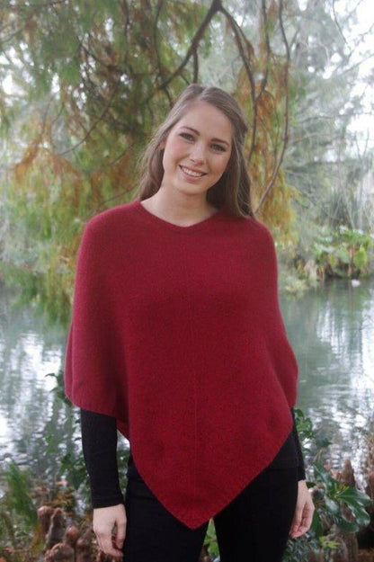 Raspberry red possum and merino wool poncho. Warm, soft, lightweight possum and merino wool. Lothlorian